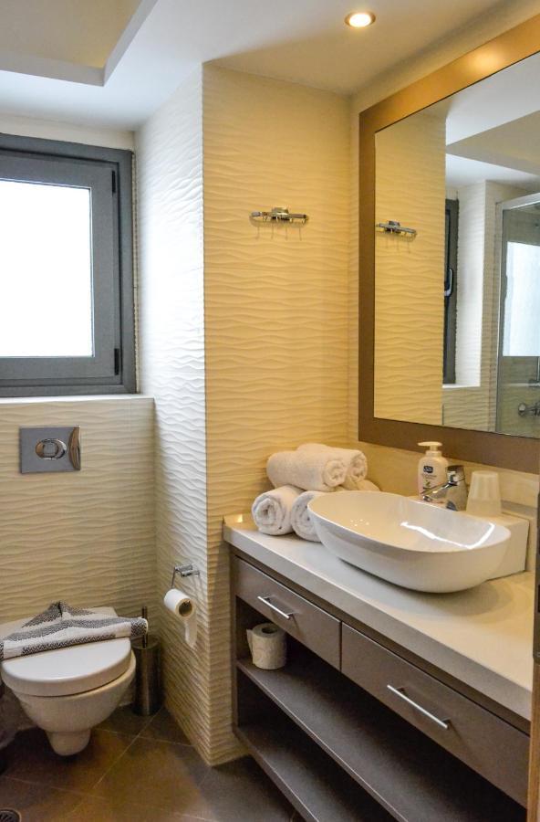 Potideon Bay Luxury Apartments 卡尔帕索斯 外观 照片